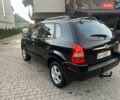 Черный Хендай Туксон, объемом двигателя 2 л и пробегом 276 тыс. км за 7450 $, фото 13 на Automoto.ua