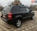 Черный Хендай Туксон, объемом двигателя 2 л и пробегом 209 тыс. км за 7999 $, фото 4 на Automoto.ua