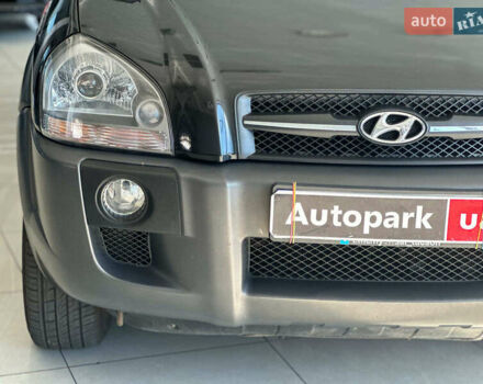 Черный Хендай Туксон, объемом двигателя 2.7 л и пробегом 158 тыс. км за 7940 $, фото 5 на Automoto.ua