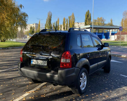 Черный Хендай Туксон, объемом двигателя 1.98 л и пробегом 218 тыс. км за 7200 $, фото 4 на Automoto.ua