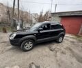 Чорний Хендай Туксон, об'ємом двигуна 2 л та пробігом 156 тис. км за 9200 $, фото 1 на Automoto.ua