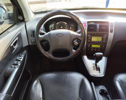 Черный Хендай Туксон, объемом двигателя 2 л и пробегом 82 тыс. км за 7490 $, фото 27 на Automoto.ua