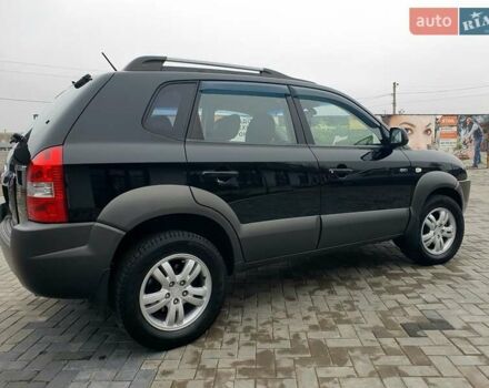 Чорний Хендай Туксон, об'ємом двигуна 2 л та пробігом 225 тис. км за 8000 $, фото 6 на Automoto.ua