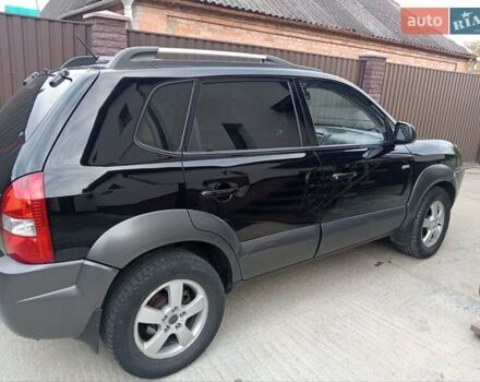 Хендай Туксон 2008 у Вінниці на Automoto.ua Чорний Хендай Туксон, об'ємом двигуна 1.98 л та пробігом 175 тис. км за 8800 $, фото 6 на Automoto.ua