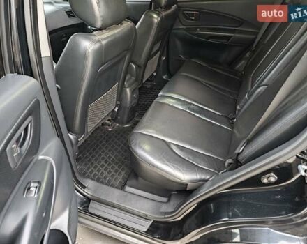 Черный Хендай Туксон, объемом двигателя 2 л и пробегом 182 тыс. км за 9000 $, фото 1 на Automoto.ua