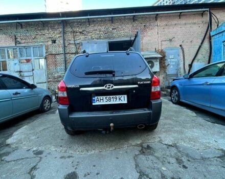 Черный Хендай Туксон, объемом двигателя 2 л и пробегом 220 тыс. км за 7000 $, фото 1 на Automoto.ua