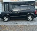 Чорний Хендай Туксон, об'ємом двигуна 2 л та пробігом 110 тис. км за 8750 $, фото 4 на Automoto.ua