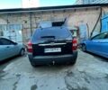 Черный Хендай Туксон, объемом двигателя 2 л и пробегом 220 тыс. км за 7000 $, фото 1 на Automoto.ua