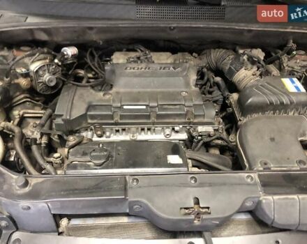 Чорний Хендай Туксон, об'ємом двигуна 1.98 л та пробігом 220 тис. км за 8000 $, фото 10 на Automoto.ua