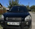 Черный Хендай Туксон, объемом двигателя 2 л и пробегом 334 тыс. км за 8700 $, фото 1 на Automoto.ua