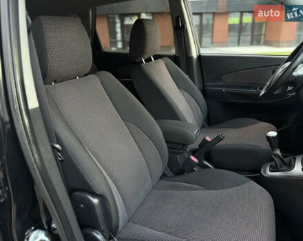 Чорний Хендай Туксон, об'ємом двигуна 2 л та пробігом 156 тис. км за 7850 $, фото 39 на Automoto.ua