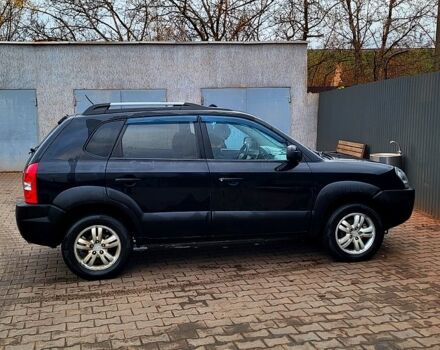 Черный Хендай Туксон, объемом двигателя 2 л и пробегом 223 тыс. км за 7500 $, фото 10 на Automoto.ua