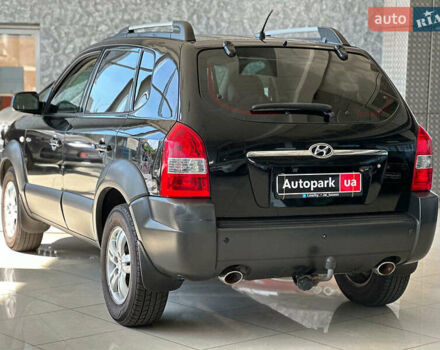 Черный Хендай Туксон, объемом двигателя 2.7 л и пробегом 158 тыс. км за 7940 $, фото 8 на Automoto.ua