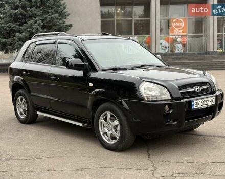 Черный Хендай Туксон, объемом двигателя 1.99 л и пробегом 240 тыс. км за 7200 $, фото 12 на Automoto.ua