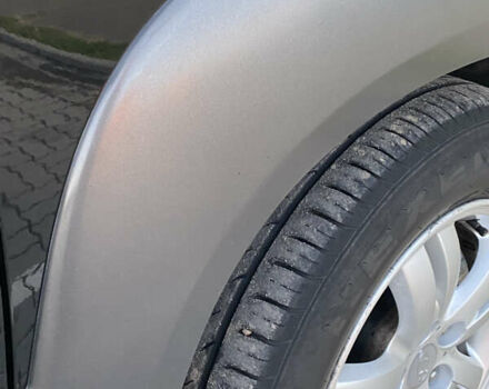 Черный Хендай Туксон, объемом двигателя 1.98 л и пробегом 254 тыс. км за 7700 $, фото 8 на Automoto.ua