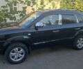 Черный Хендай Туксон, объемом двигателя 2 л и пробегом 214 тыс. км за 8350 $, фото 22 на Automoto.ua