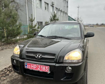 Черный Хендай Туксон, объемом двигателя 2 л и пробегом 136 тыс. км за 8500 $, фото 2 на Automoto.ua