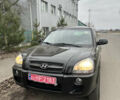 Черный Хендай Туксон, объемом двигателя 2 л и пробегом 136 тыс. км за 8500 $, фото 2 на Automoto.ua