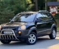 Чорний Хендай Туксон, об'ємом двигуна 2 л та пробігом 207 тис. км за 7600 $, фото 4 на Automoto.ua