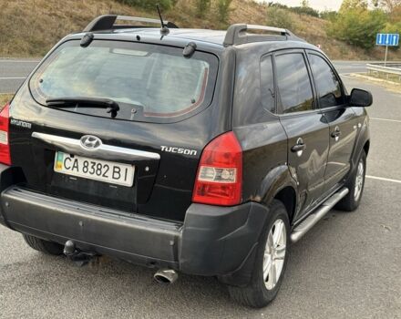 Чорний Хендай Туксон, об'ємом двигуна 2 л та пробігом 291 тис. км за 5400 $, фото 3 на Automoto.ua