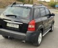Чорний Хендай Туксон, об'ємом двигуна 2 л та пробігом 291 тис. км за 5400 $, фото 3 на Automoto.ua
