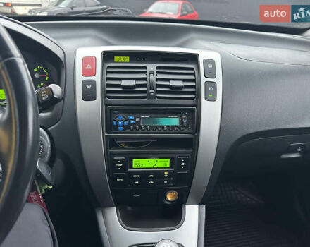 Чорний Хендай Туксон, об'ємом двигуна 2 л та пробігом 243 тис. км за 7999 $, фото 34 на Automoto.ua