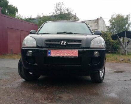 Чорний Хендай Туксон, об'ємом двигуна 2 л та пробігом 225 тис. км за 7850 $, фото 5 на Automoto.ua