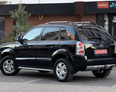 Чорний Хендай Туксон, об'ємом двигуна 2 л та пробігом 156 тис. км за 7850 $, фото 20 на Automoto.ua