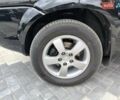 Черный Хендай Туксон, объемом двигателя 2 л и пробегом 137 тыс. км за 8400 $, фото 8 на Automoto.ua