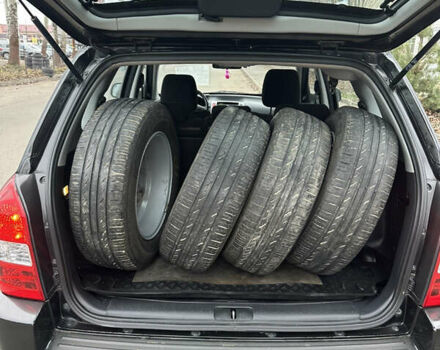 Черный Хендай Туксон, объемом двигателя 2 л и пробегом 136 тыс. км за 8500 $, фото 30 на Automoto.ua