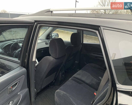 Черный Хендай Туксон, объемом двигателя 2 л и пробегом 198 тыс. км за 7500 $, фото 7 на Automoto.ua