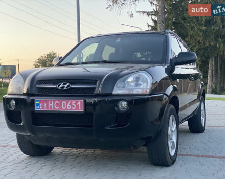 Черный Хендай Туксон, объемом двигателя 2 л и пробегом 250 тыс. км за 7950 $, фото 39 на Automoto.ua