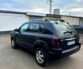 Черный Хендай Туксон, объемом двигателя 2 л и пробегом 215 тыс. км за 6700 $, фото 5 на Automoto.ua