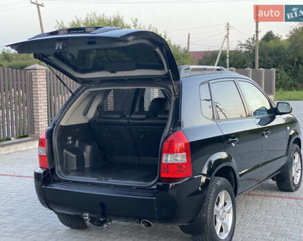 Черный Хендай Туксон, объемом двигателя 2 л и пробегом 250 тыс. км за 7950 $, фото 12 на Automoto.ua