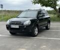 Черный Хендай Туксон, объемом двигателя 2 л и пробегом 233 тыс. км за 7500 $, фото 1 на Automoto.ua