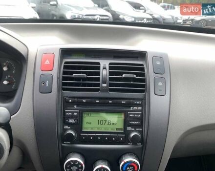 Черный Хендай Туксон, объемом двигателя 2 л и пробегом 117 тыс. км за 7990 $, фото 24 на Automoto.ua