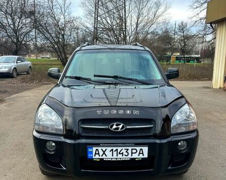 Черный Хендай Туксон, объемом двигателя 2 л и пробегом 215 тыс. км за 6700 $, фото 1 на Automoto.ua