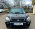 Черный Хендай Туксон, объемом двигателя 2 л и пробегом 215 тыс. км за 6700 $, фото 1 на Automoto.ua