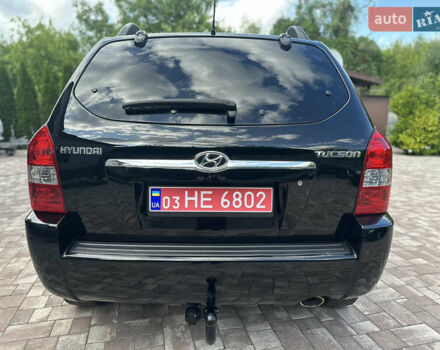 Черный Хендай Туксон, объемом двигателя 2 л и пробегом 218 тыс. км за 8700 $, фото 15 на Automoto.ua
