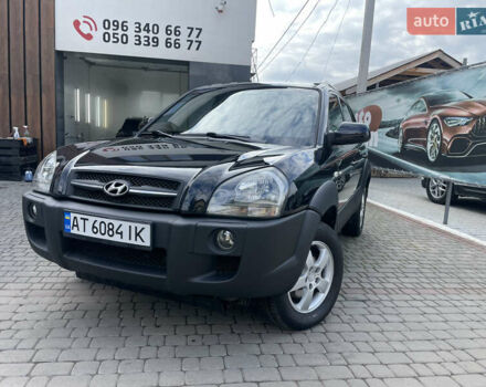 Черный Хендай Туксон, объемом двигателя 1.98 л и пробегом 177 тыс. км за 7600 $, фото 1 на Automoto.ua