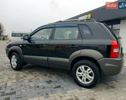 Чорний Хендай Туксон, об'ємом двигуна 2 л та пробігом 225 тис. км за 8000 $, фото 18 на Automoto.ua