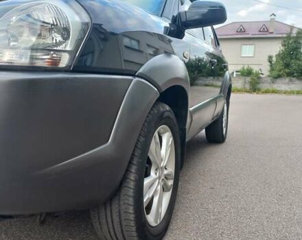 Черный Хендай Туксон, объемом двигателя 2 л и пробегом 168 тыс. км за 9000 $, фото 14 на Automoto.ua