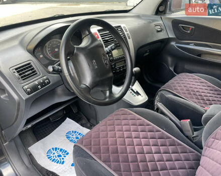 Черный Хендай Туксон, объемом двигателя 1.98 л и пробегом 177 тыс. км за 7600 $, фото 18 на Automoto.ua