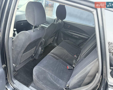 Чорний Хендай Туксон, об'ємом двигуна 2 л та пробігом 240 тис. км за 6888 $, фото 16 на Automoto.ua