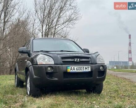 Черный Хендай Туксон, объемом двигателя 2 л и пробегом 148 тыс. км за 9500 $, фото 1 на Automoto.ua