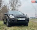 Черный Хендай Туксон, объемом двигателя 2 л и пробегом 148 тыс. км за 9500 $, фото 1 на Automoto.ua