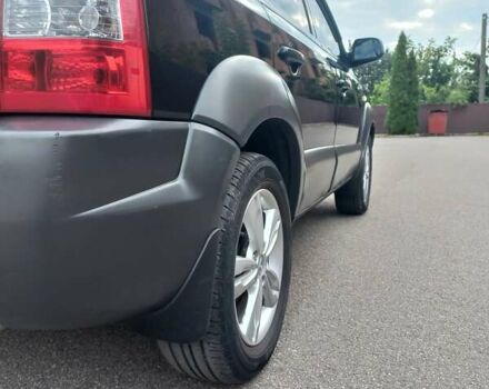 Черный Хендай Туксон, объемом двигателя 2 л и пробегом 168 тыс. км за 9000 $, фото 16 на Automoto.ua