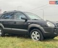 Черный Хендай Туксон, объемом двигателя 2 л и пробегом 148 тыс. км за 9500 $, фото 6 на Automoto.ua