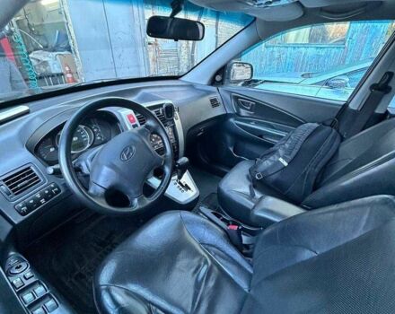 Черный Хендай Туксон, объемом двигателя 2 л и пробегом 220 тыс. км за 7000 $, фото 4 на Automoto.ua