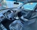 Черный Хендай Туксон, объемом двигателя 2 л и пробегом 220 тыс. км за 7000 $, фото 4 на Automoto.ua